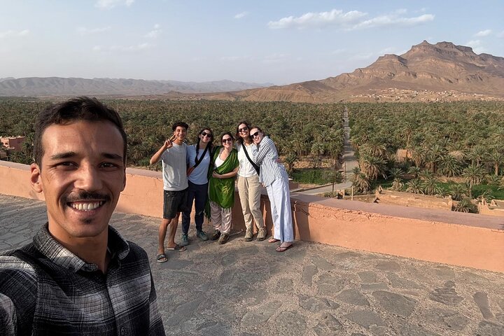 Navigate Morocco local guide with travelers in the Marrakech medina